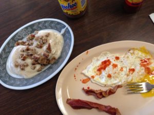 Bacon, eggs with hot sauce, and sausage gravy from Geneva Store. Photo by Brad Staton. 